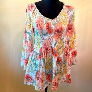 Floral & Ivy bohemian top in peach and yellow floral print. It is a medium.